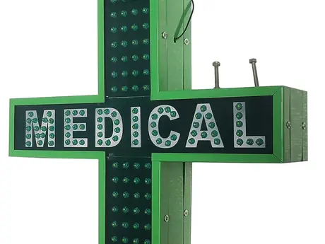 Medical sign board with green LED cross for pharmacies and clinics by LED Arts